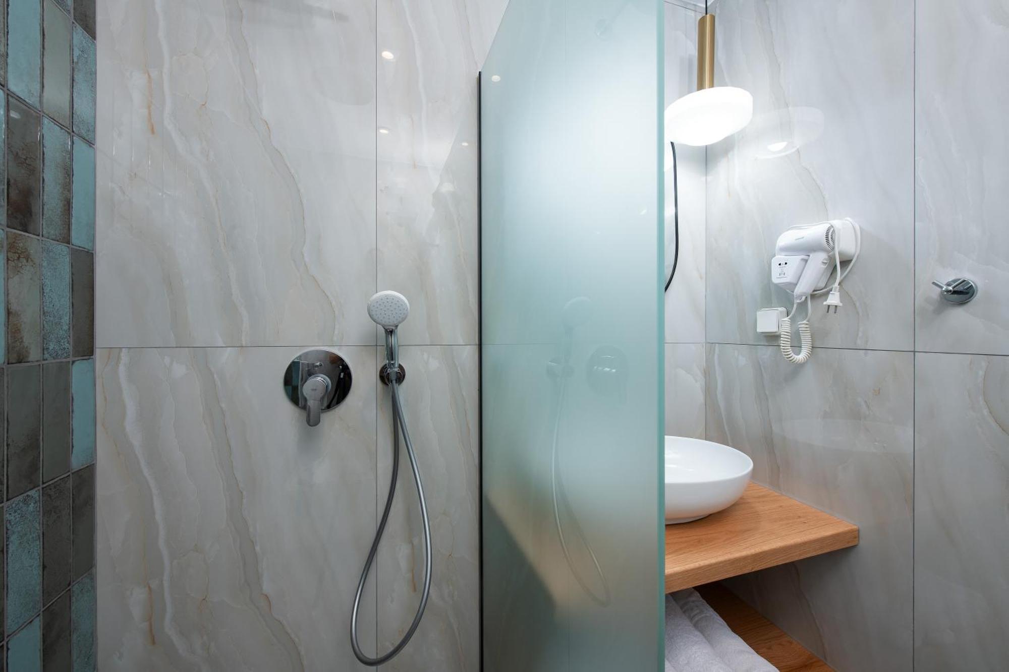 Olivento Beach Front Suites Potos Bagian luar foto